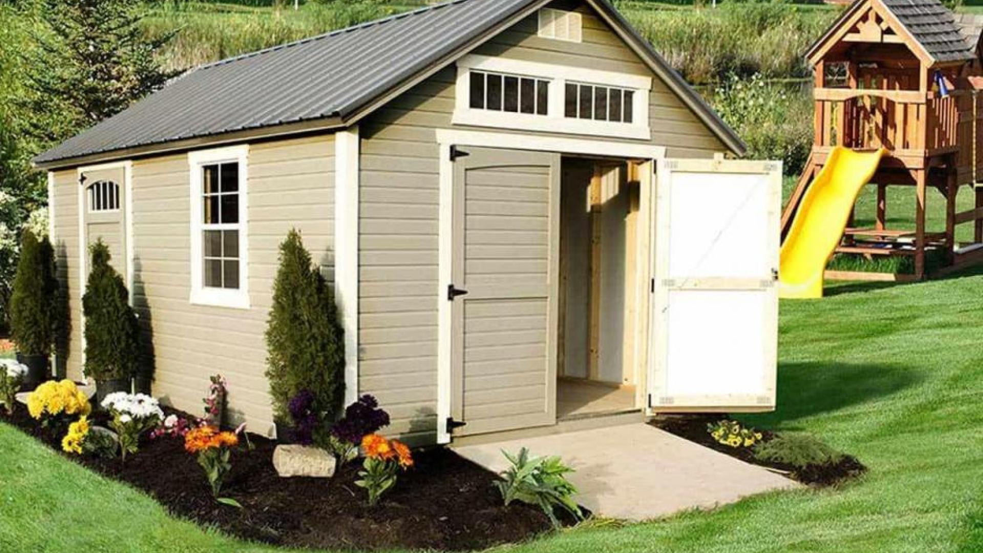 Tan garden shed with white trim